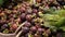 Fruits and vegetables on rustic stall. Assorted fresh ripe fruits and vegetables placed on rustic oriental stall in market. sweet