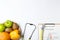 Fruits, vegetables, stethoscope and list of products on white background, top view