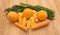 Fruits and vegetables on wooden background - oranges carrots and dill. Health benefits concept