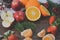 Fruits on wooden background.