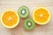 Fruity background set of slices of orange fruit and kiwi