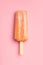 Fruity ice lolly. Sweet popsicle on pink table