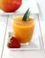 Fruity mango smoothie with strawberry