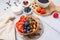 Fruity yogurt waffle bowl. Healthy diet friendly dessert.