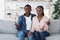 Frustrated Black Couple Sitting On Couch At Family Counselor`s Office, Suffering Misunderstanding