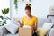 Frustrated black woman unpacking wrong box, delivery mistake