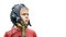 Frustrated boy in vintage pilot helmet looks up on white background