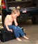 Frustrated Child Sitting on Suitcase