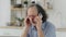 Frustrated elderly mature retired man feeling upset desperate talking on the phone having problems debt, stressed sad