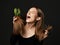 Frustrated woman with long silky straight hair in black body screaming yelling holding cactus plant comparing with split
