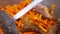 Fry pieces of meat in a frying pan. Stew meat with carrots in a frying pan. To mix meat and carrots in a frying pan