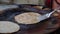 Frying Aaloo Paratha on Tawa Delicacy in the Streets of Delhi