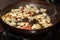 Frying apple slices in a pan close-up. Selective focus. Food preparation