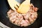 Frying beef meat in sesame oil