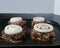 Frying burgers on top of a stove