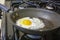 Frying Egg in Skillet Sunny-Side Up