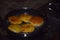 Frying indian famous food chapati on LPG gas stove, boiling oil in frying pan with dark background