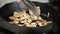 Frying mushrooms.