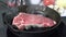 Frying a New York Strip steak in a cast iron skillet