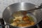 Frying pakode in pan with oil, very popular street food in India.famous indian food, Selective focus on subject