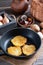 Frying pan with fried potato patties. Vegetable fritters, latkes, draniki