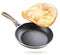 Frying pan and pancake flying on a white background. Isolated