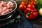 Frying pan with raw meat on the stove on vegetables background. Backstage of cooking dinner with grilled pork meat. Food concept.