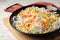 Frying pan with rice noodles, shrimps and vegetables