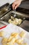 Frying torta frita in a steel basket