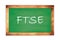 FTSE text written on green school board