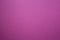 Fuchsia background, textured embossed pink surface