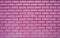 Fuchsia brick wall texture background material construction