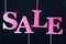 Fuchsia sale text on dark background