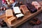 Fudge assortment close up on a wood serving board