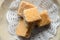 Fudge Cubes Arranged on Doily Overhead Close Up