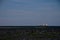 Fuel barge or tanker ship off the coast of Hudson Bay waiting to provide fuel for an arctic community