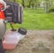 Fuel basket of lawnmower grass cutter equipment on garden