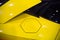 Fuel cap of a yellow sportscar