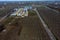 Fuel top view, drone at a small modern winery in the fall. Modern winery with large tanks for fermentation and storage of