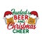 Fueled by beer and Christmas cheer - funny text , with Santa`s cap on beer mug.