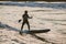 Fuengirola, Spain; December 19, 2019; Silhouette of man paddleboarding