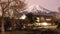 Fuji mount with snow on top in spring at Oshino Hakkai night tim