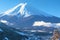 Fuji mountain adorned with a snowy crown, captured in scenic splendor