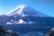 Fuji mountain adorned with a snowy crown, captured in scenic splendor