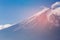 Fuji mountain volcano close up against clear blue sky background, Japan