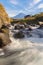 Fuji Mountain and waterfall with stones at Shiba River. Nature landscape background. it is located in Japan in travel trip on