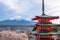 Fujiyoshida landmark of Japan Chureito red Pagoda on Fuji mountain background, clear sky almost in sunset light red Pagoda with pi