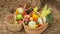 Full Baskets with fruits and vegetables. Summer Harvest concept. Apples, grapes, cauliflower, carrots, eggplant, peppers, onions,