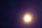full Beaver Moon on dark cloud on the night sky