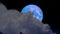 Full blue moon back on night sky and blur cloud moving pass